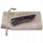 Obrázek Lovecký nůž s pojistkou, klipem a přírodním obalem